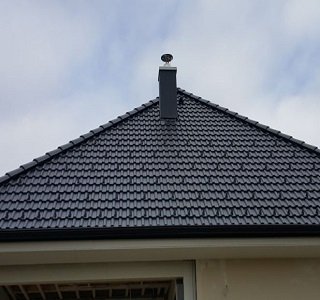 Zaključek dimnika z obložnim elementom