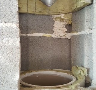 Sanacija dimnika s pomočjo specialnega orodja. poseg v dimnik